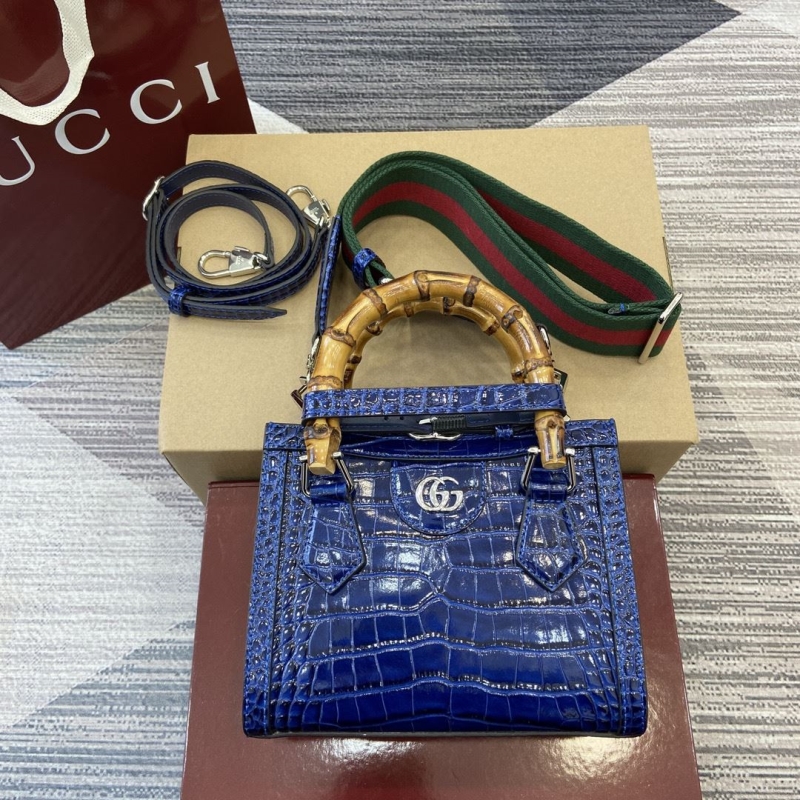G*u*i top handle bags